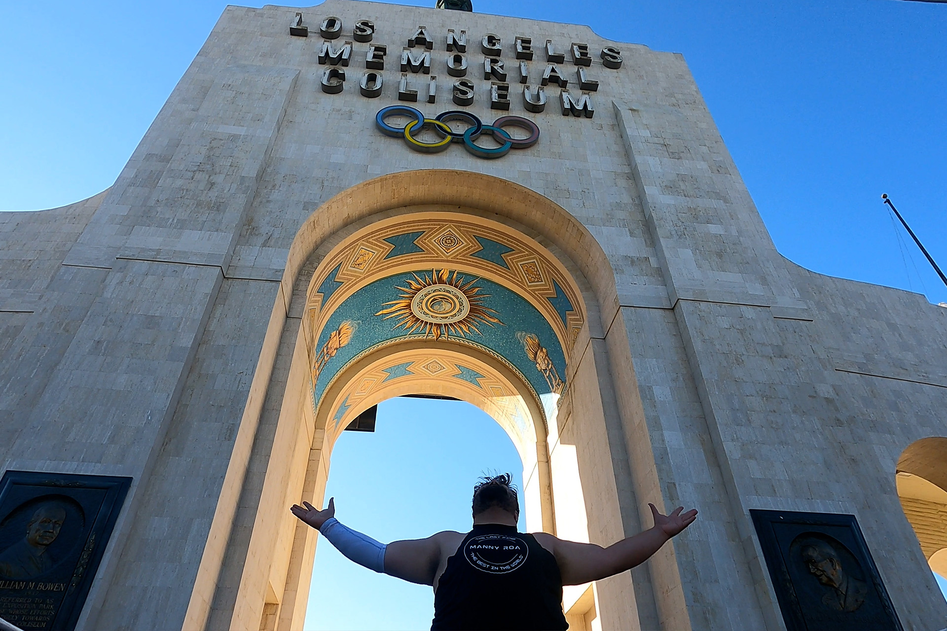 The Last King of Professional Wrestling celebrating victory at the iconic LA Memorial Coliseum during a PCW event